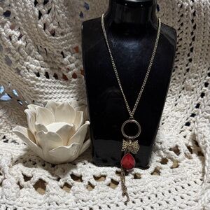 Elegant Red Teardrop Pendant Necklace with Bow Accent